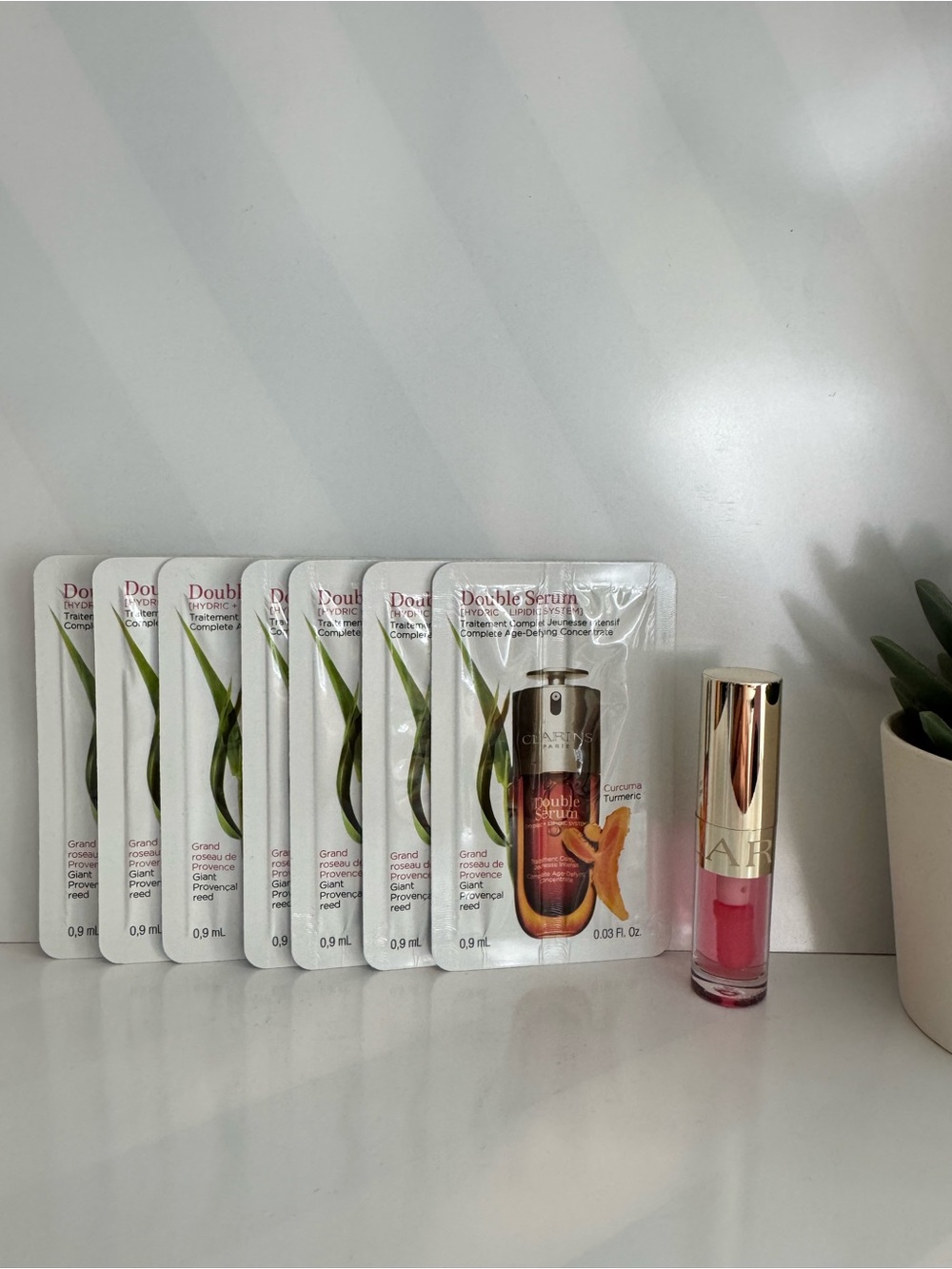 7x Clarins Double Serum Sample 0.03oz + Clarins Lip Comfort Oil #04 pitaya